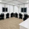 White interior portable cabin with work desks