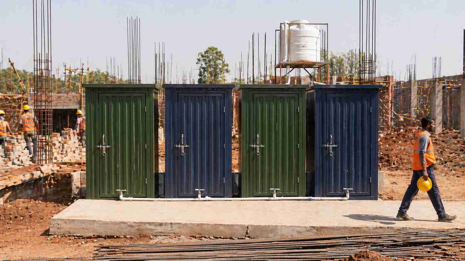 portable toilet construction site row 4 units India BOCW compliance