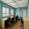 Container office with blue walls and modular workstations
