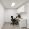 Container office with modern white interior setup in Bangalore
