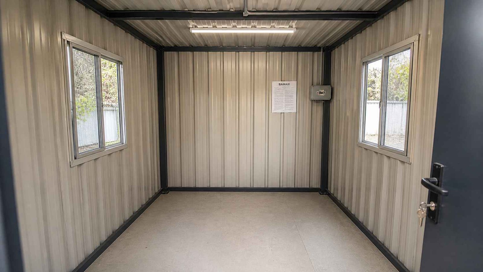 low cost porta cabin entry level interior India IS 2062 corrugated MS no insulation cement floor standard SAMAN