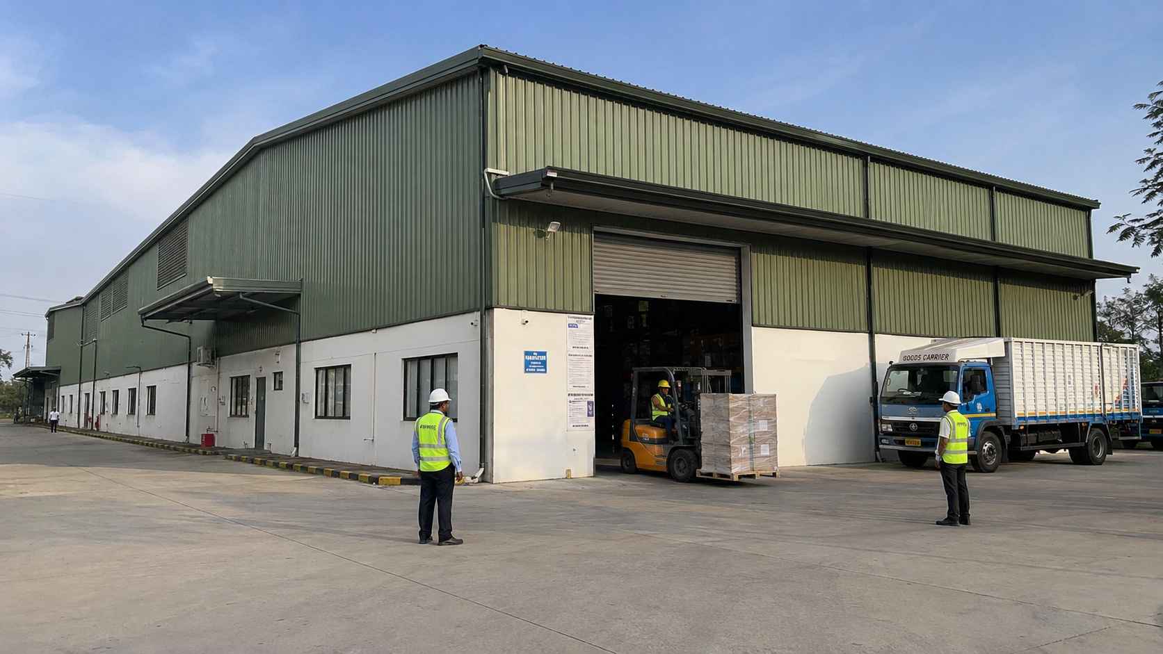 Green engineered metal building in use as a production and distribution unit in India