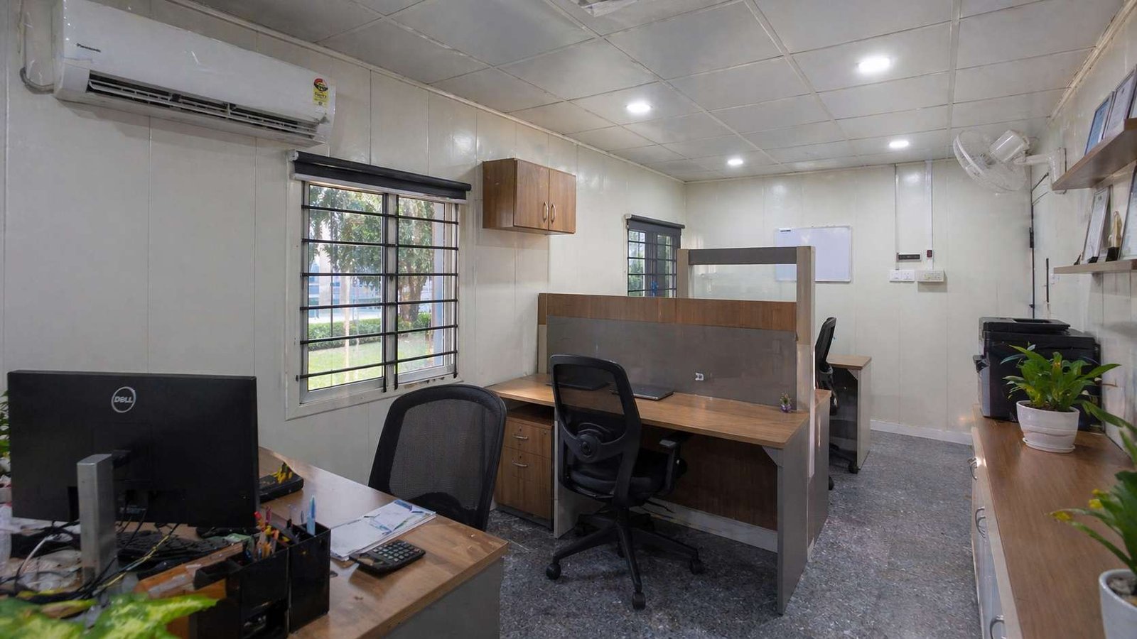 portable office cabin interior with AC false ceiling workstations and full electrical fitout