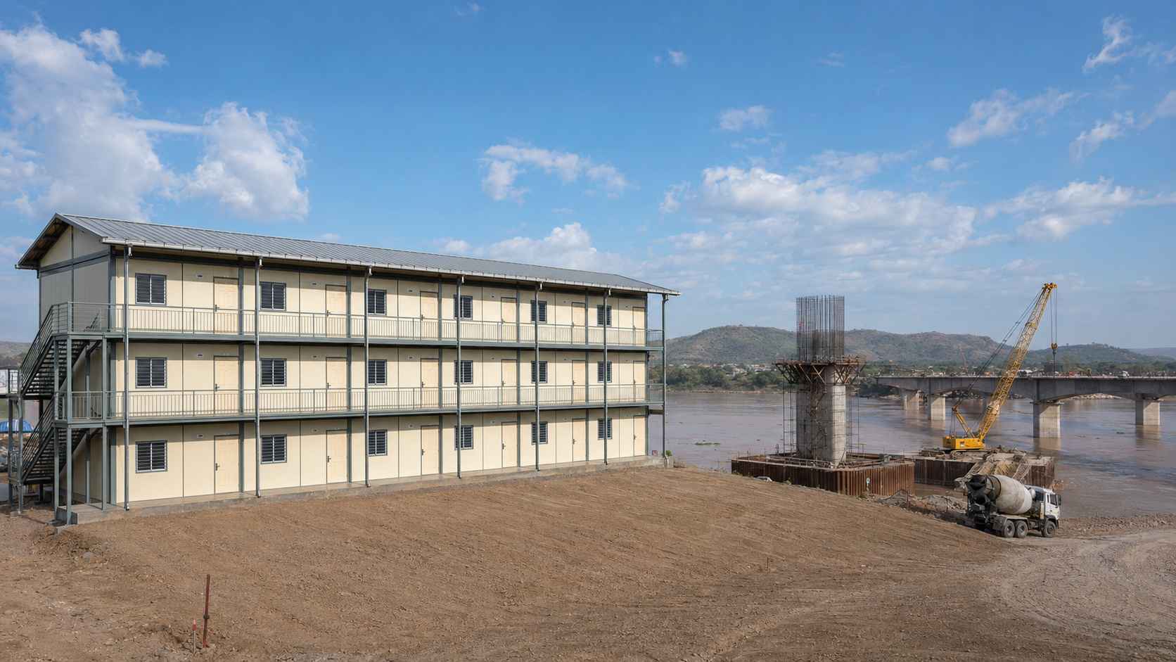 G+2 SAMAN labor shelter block on a river bank near a bridge construction project in rural India