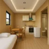 Interior of a luxury container studio with bed, four-seater dining, L-shaped kitchenette, and bathroom entry