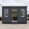 Front elevation of a modern office cabin with frameless glass entry door