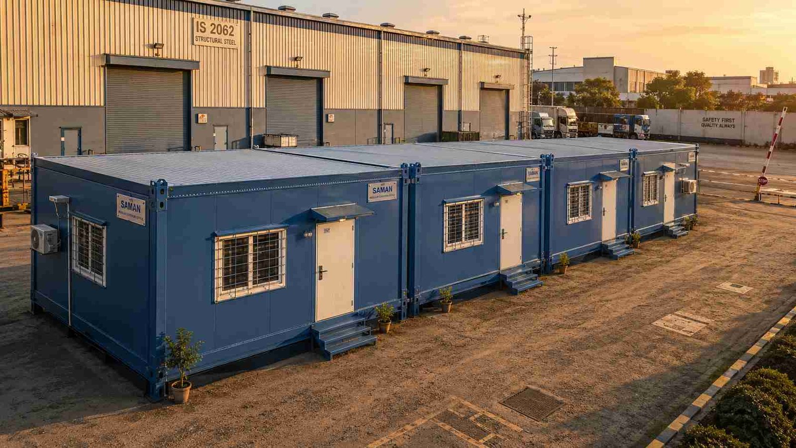 Steel Blue SAMAN modular container office four-unit complex at industrial warehouse campus showing complete phased system.