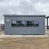 Steel Grey modular office building side elevation showing the full 20-ft wall and window line.