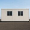 Side elevation of a 19×9 ft modular portable office cabin showing two aluminium sliding windows along the long wall.