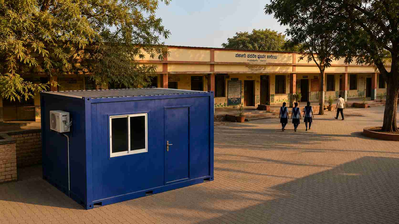 Royal Cobalt office cabin in an Indian school courtyard, classroom or admin extension, students and staff walking past.