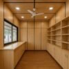 Wooden finish Porta Cabin shop with shelving