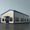 Pre-engineered metal building with navy-blue trim and cream metal cladding, entrance canopy and windows