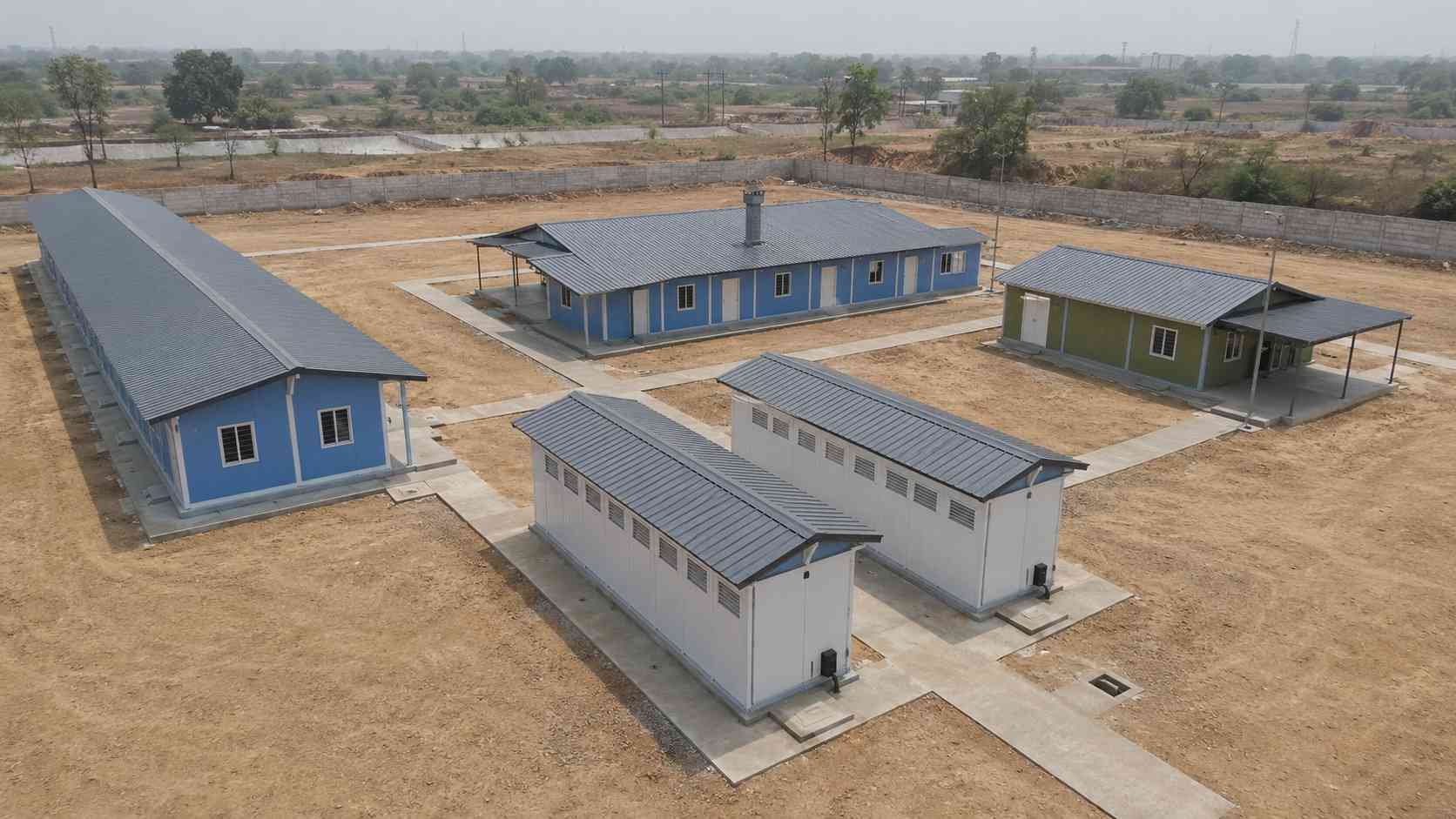 Layout of a complete prefab labour colony showing dormitory, dining, sanitation, and recreation blocks