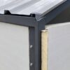Close-up of MS frame and PUF sandwich panel corner detail on a prefab colony unit
