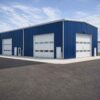 Interior production floor of a prefab manufacturing building with a clear column-free span.
