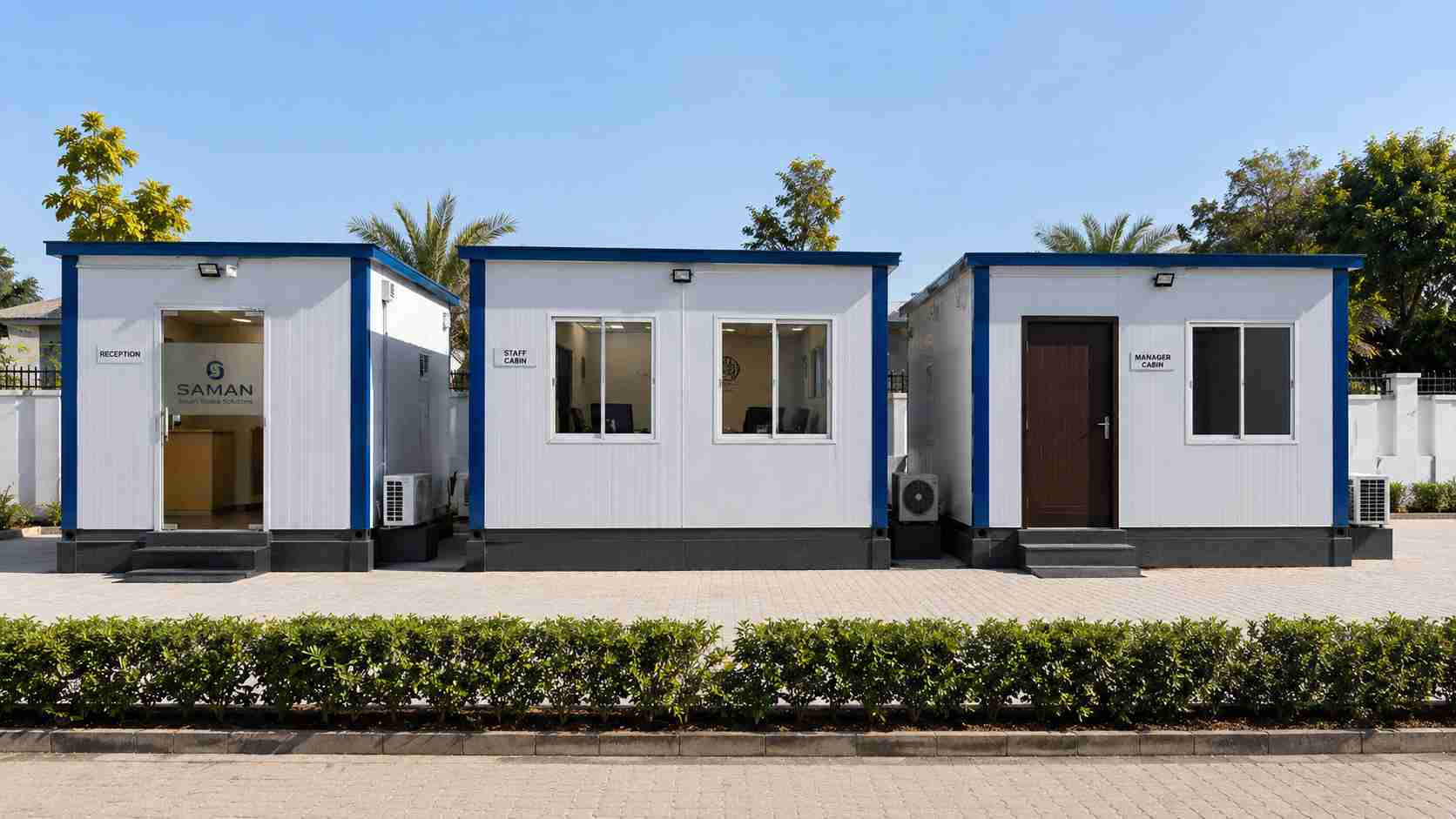 Three prefabricated office cabins from one bulk order configured as reception, staff, and manager