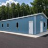 Blue prefabricated steel building shown along its long side wall with white doors and windows.
