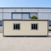 Side view of SAMAN readymade office cabin showing window placement and steel frame