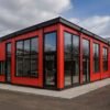 red-modular-building-with-large-windows