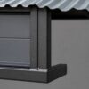 Detail of the SAMAN steel guard cabin corner showing MS frame meeting factory-painted wood panel