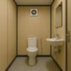Toilet porta cabin interior with western WC and basin
