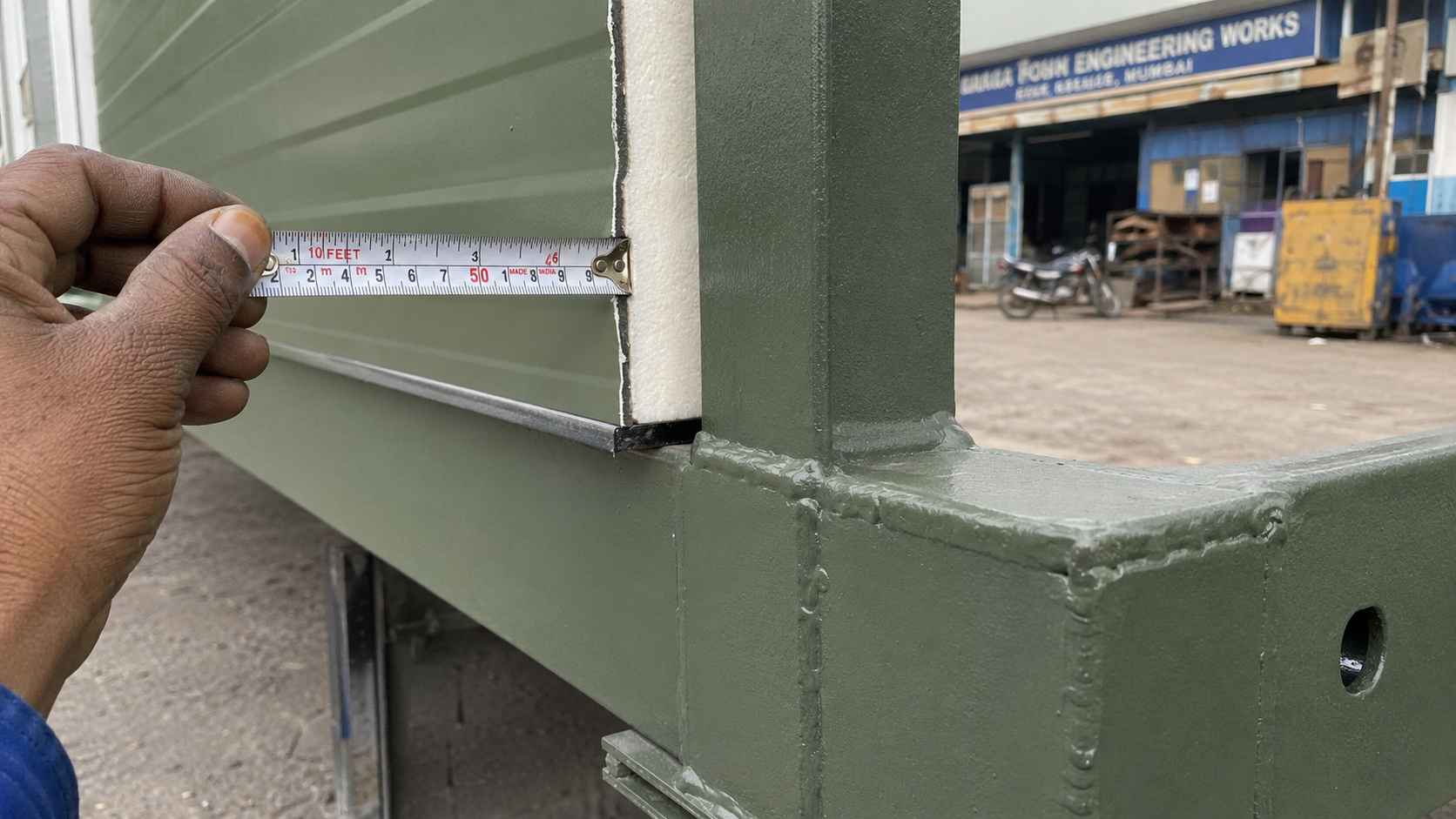 Sage Industrial mobile office unit showing 50mm PUF panel thickness and MS frame weld joint detail