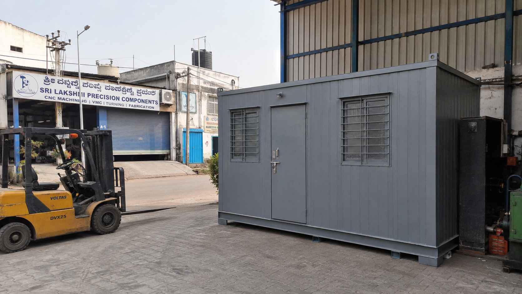 Porta cabin in Steel Grey installed inside a Peenya Industrial Area factory compound off Tumkur Road, Bangalore.