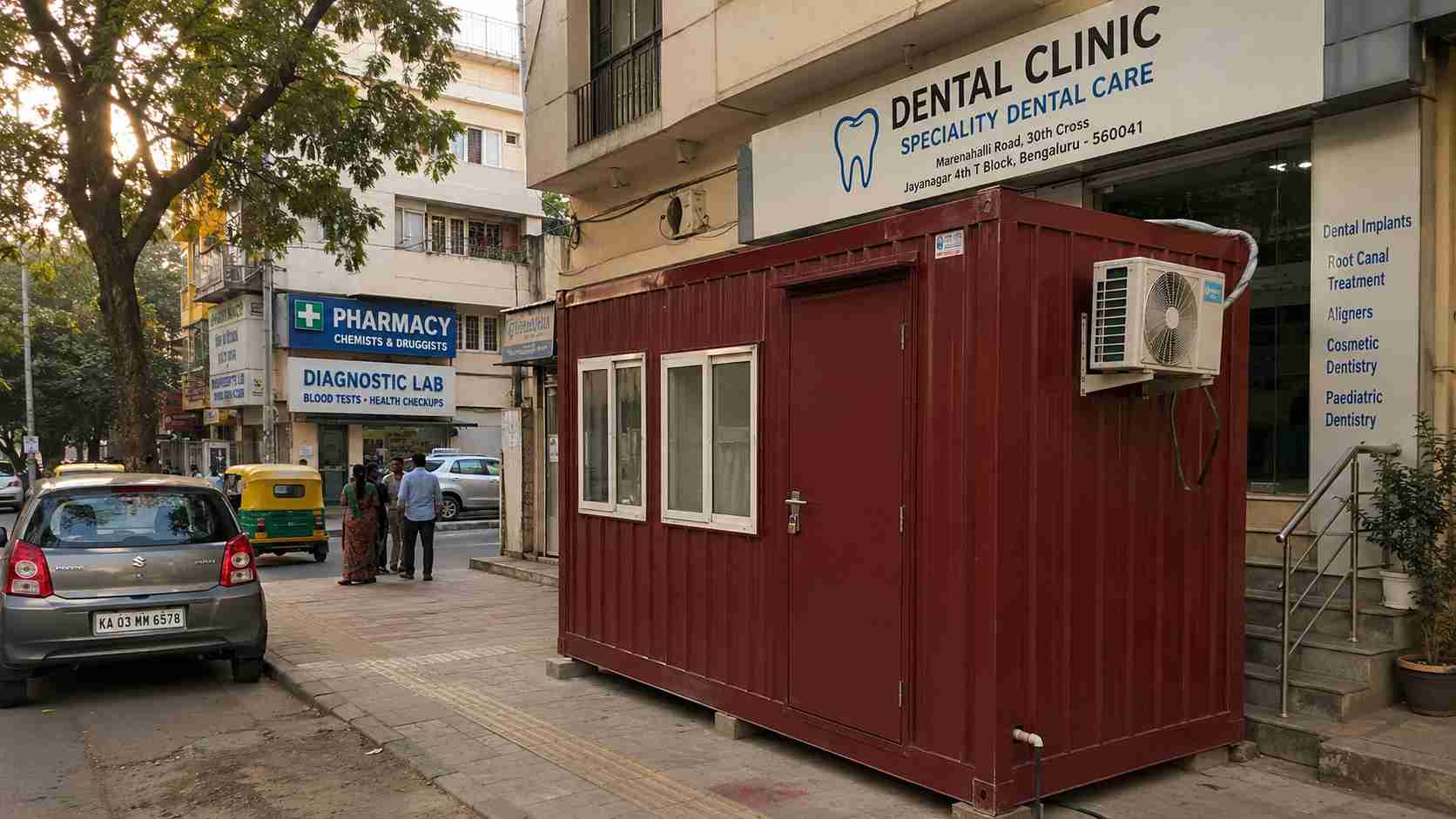 Burgundy Red porta cabin used as a temporary dental clinic fitout on Marenahalli Road, Jayanagar.
