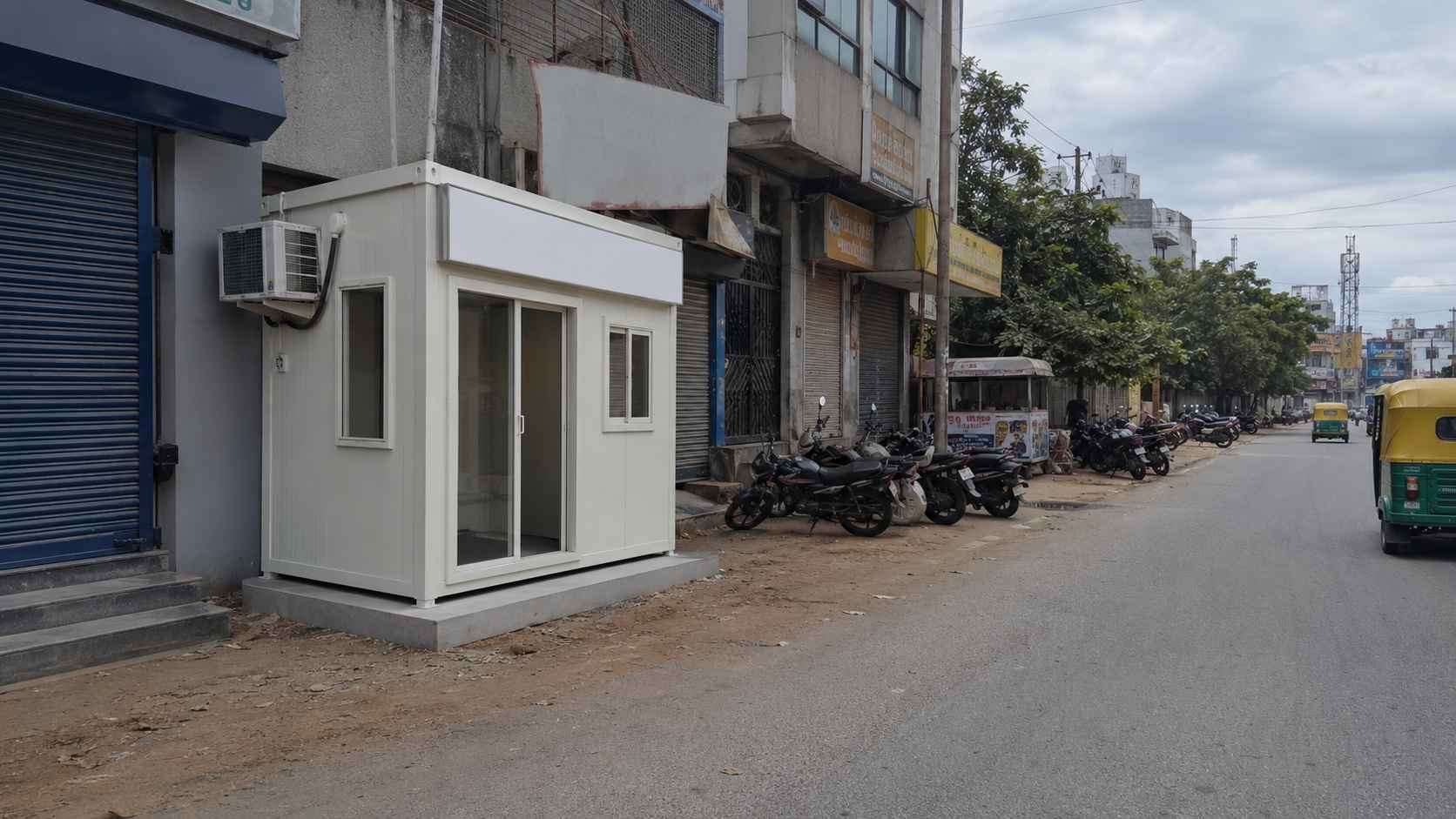Pure White SAMAN porta cabin installed as a clinical diagnostic-lab frontage on Bannerghatta Road in JP Nagar.