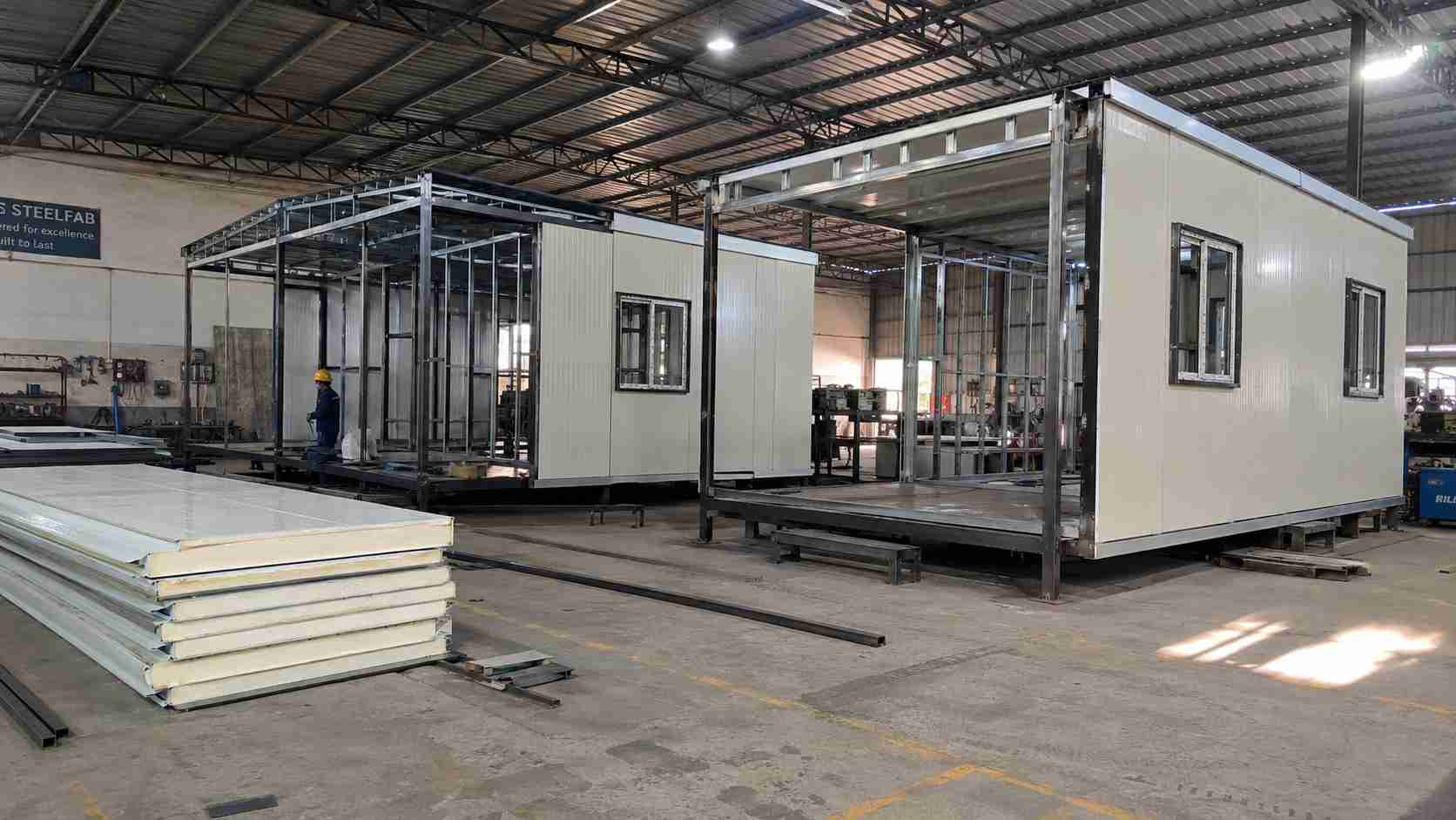 Portable office cabins being fabricated on a mild-steel frame line in SAMAN's Bangalore facility.